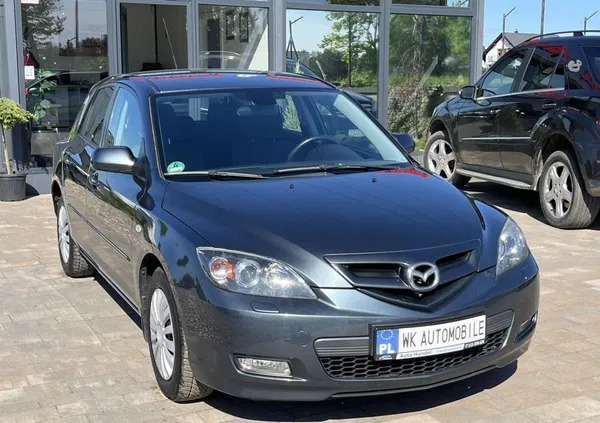 mazda pomorskie Mazda 3 cena 14300 przebieg: 230000, rok produkcji 2009 z Milanówek